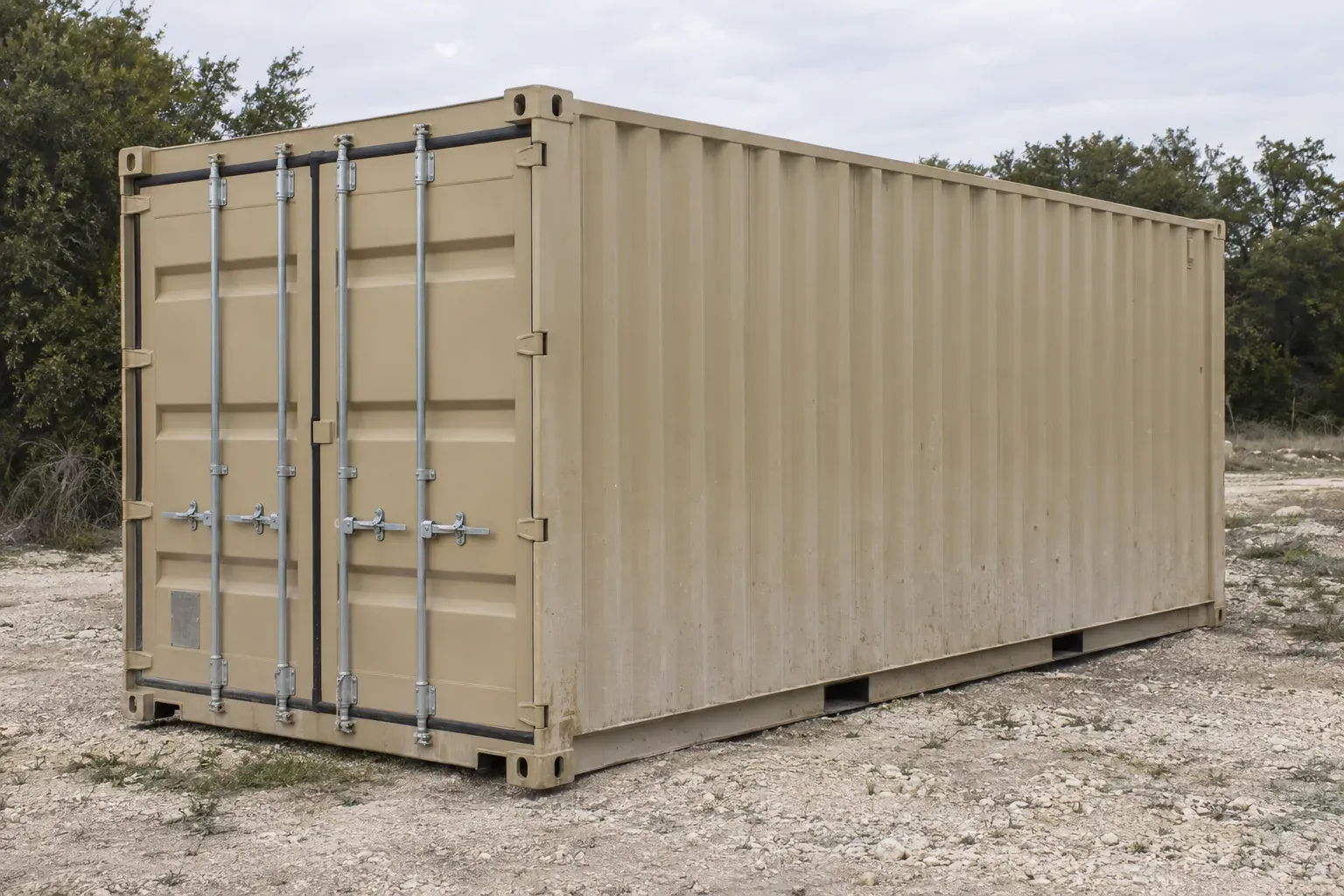 New tan 20ft container on a rocky caliche lot with cedar and oak outside Texas